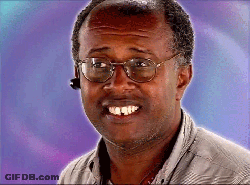 Man In Glasses And Headset Looking At Camera GIF