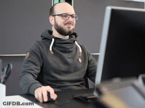 Man In Glasses And Hoodie At Computer GIF