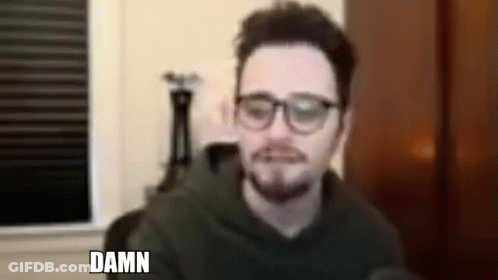 Man In Glasses And Hoodie Saying Damn GIF