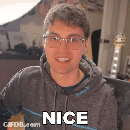 Man In Glasses And Hoodie Saying Nice GIF