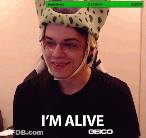 Man In Glasses And Leopard Print Hat Says I'm Alive Geico GIF