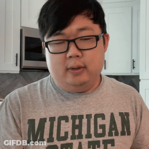 Man In Glasses And Michigan State T-Shirt GIF