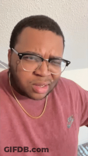 Man In Glasses And Nike Shirt Making Face GIF