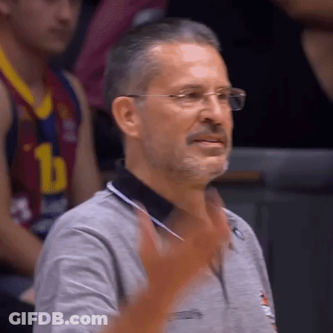 Man In Glasses And Number 1 Shirt Applauding At Basketball Game GIF