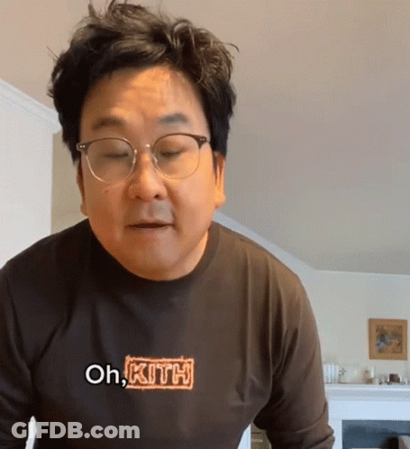 Man In Glasses And Oh Kith Shirt GIF