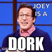 Man In Glasses And Pink Shirt Saying Joey Is A Dork GIF
