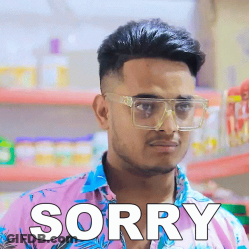 Man In Glasses And Pink Shirt Saying Sorry GIF