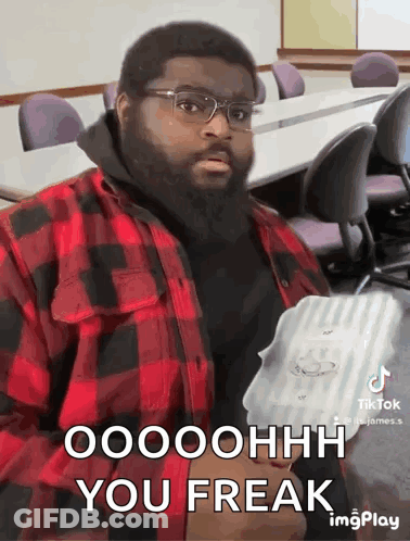 Man In Glasses And Plaid Shirt Saying Oooohhh You Freak GIF