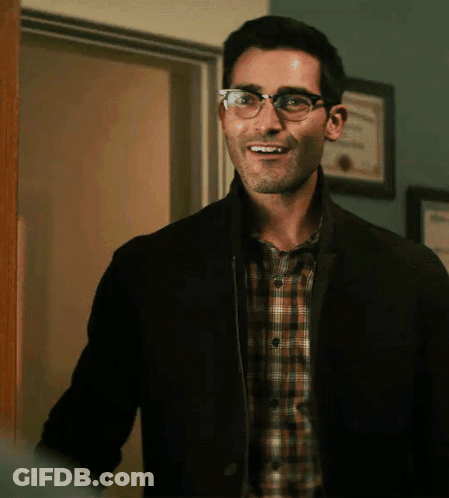 Man In Glasses And Plaid Shirt Smiling GIF