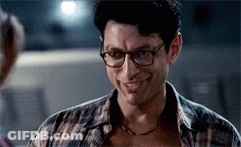 Man In Glasses And Plaid Shirt Smiling At Woman GIF