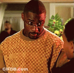 Man In Glasses And Plaid Sweater Talking To Woman GIF