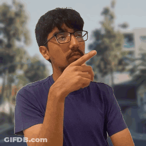 Man In Glasses And Purple Shirt Pointing At Chin GIF