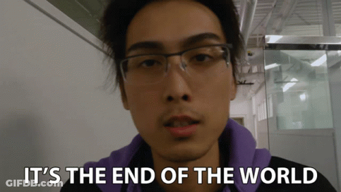 Man In Glasses And Purple Sweatshirt Says It's The End Of The World GIF