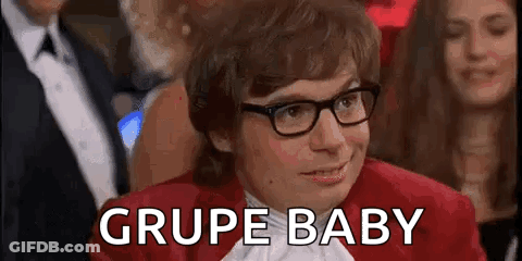 Man In Glasses And Red Jacket Saying Grupe Baby GIF