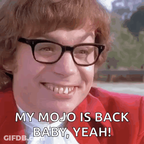 Man In Glasses And Red Jacket Saying Mojo Is Back GIF
