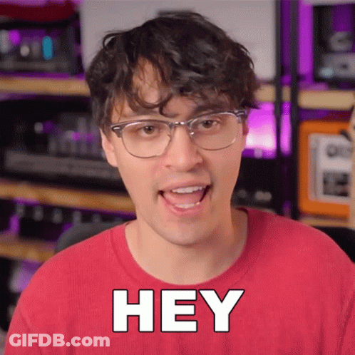 Man In Glasses And Red Shirt Saying Hey GIF