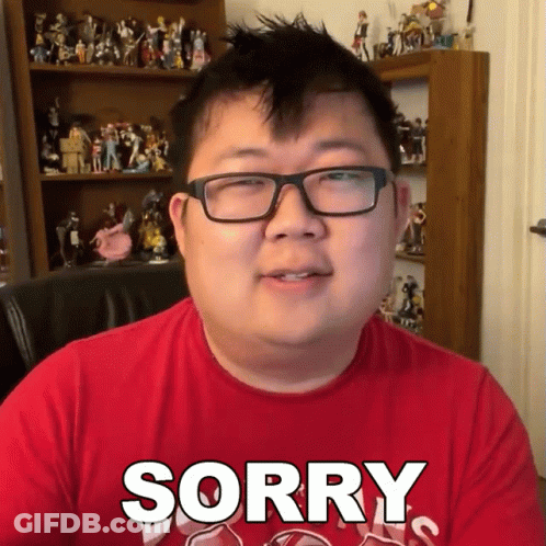Man In Glasses And Red Shirt Saying Sorry GIF