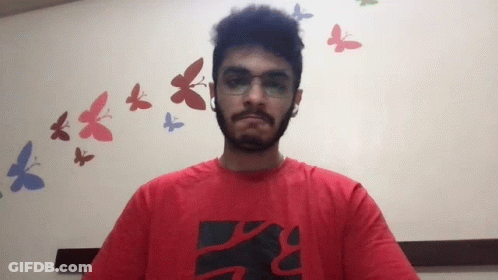 Man In Glasses And Red T-Shirt With Letter X GIF