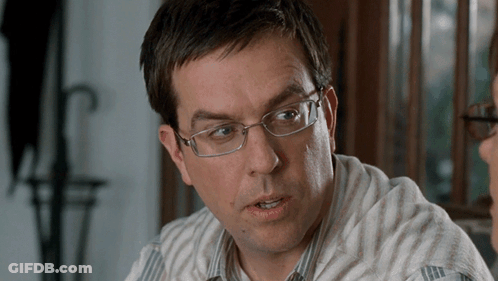 Man In Glasses And Striped Shirt Talking To Another Man GIF