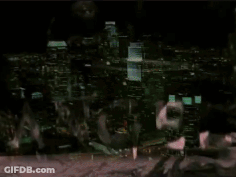 Man In Glasses And Suit And Tie Looking GIF
