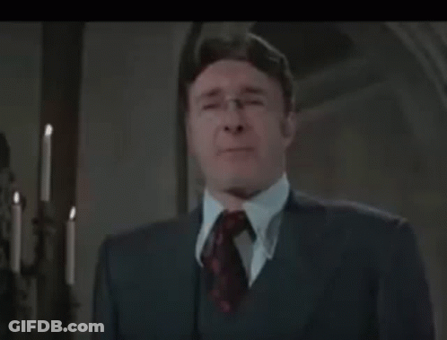 Man In Glasses And Suit GIF
