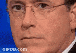 Man In Glasses And Suit Making Face GIF