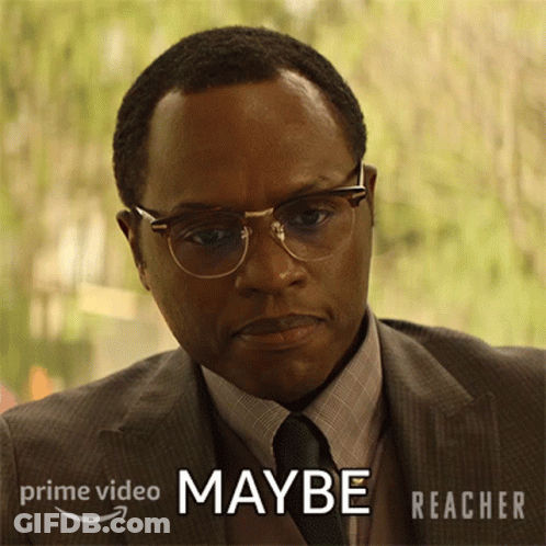 Man In Glasses And Suit Says Maybe Prime Video Ad GIF