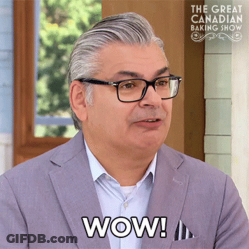 Man In Glasses And Suit Says Wow On Great Canadian Baking Show GIF