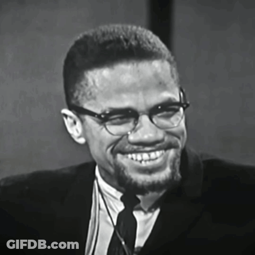Man In Glasses And Suit Smiling GIF