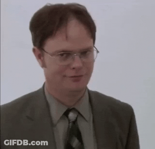 Man In Glasses And Suit Smiling GIF
