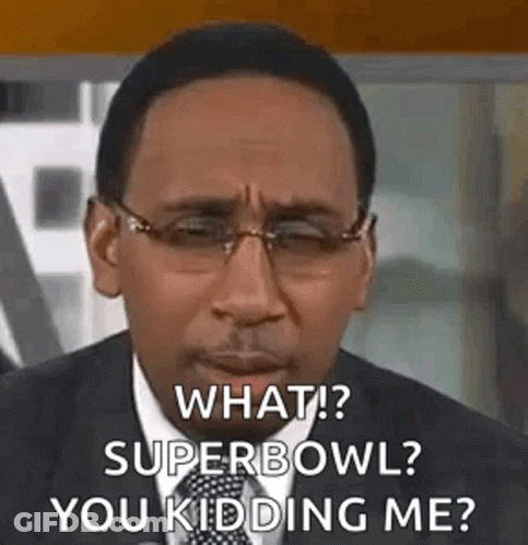 Man In Glasses And Suit Talking About Super Bowl GIF