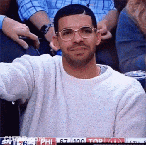Man In Glasses And Sweater Watching Basketball GIF