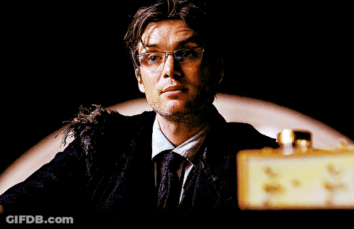 Man In Glasses And Tie Looking Up GIF