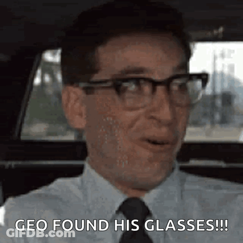 Man In Glasses And Tie Says Geo Found His Glasses GIF