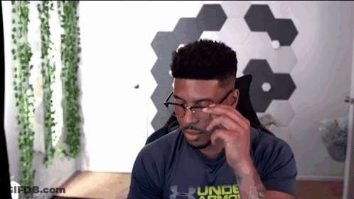 Man In Glasses And Under Armor Shirt GIF