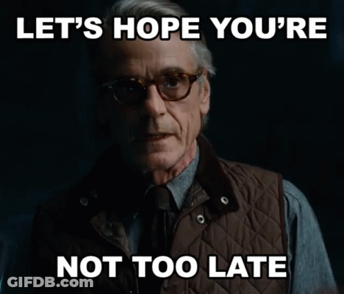 Man In Glasses And Vest Says Let's Hope You're Not Too Late GIF