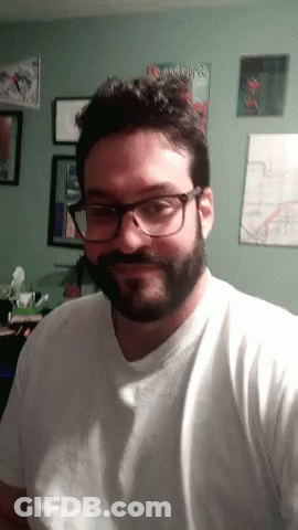 Man In Glasses And White Shirt With Book Called Tab GIF