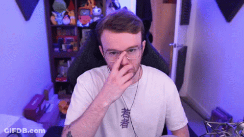 Man In Glasses And White Shirt With Chinese Writing Covering Nose GIF