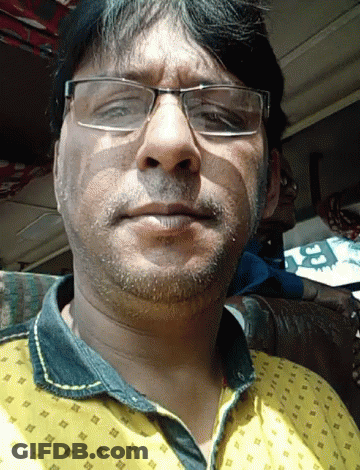 Man In Glasses And Yellow Patterned Shirt GIF