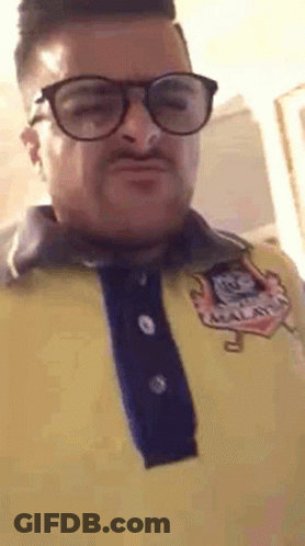 Man In Glasses And Yellow Shirt GIF