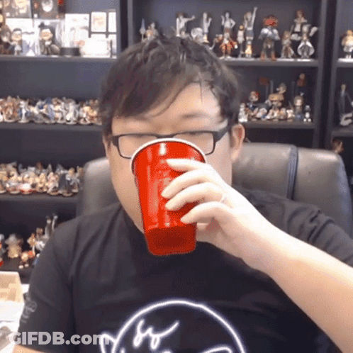 Man In Glasses Black Shirt Drinking Red Cup GIF