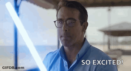 Man In Glasses Holding Lightsaber GIF