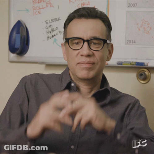 Man In Glasses In Front Of Whiteboard Saying GM Hybrid GIF