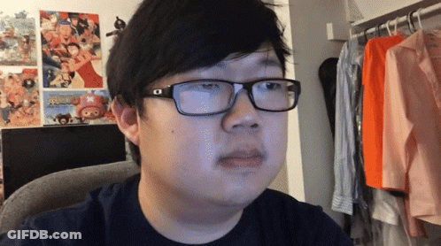 Man In Glasses Looking At Camera GIF