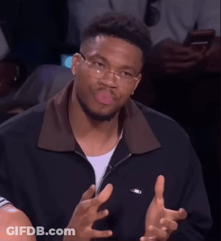 Man In Glasses Making Funny Face In Stadium GIF