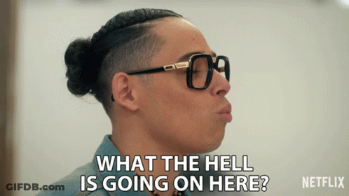 Man In Glasses Saying What The Hell Is Going On Here GIF