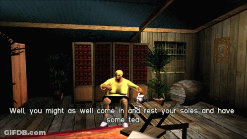 Man In Glasses Sitting In Front Of Co Wall GIF