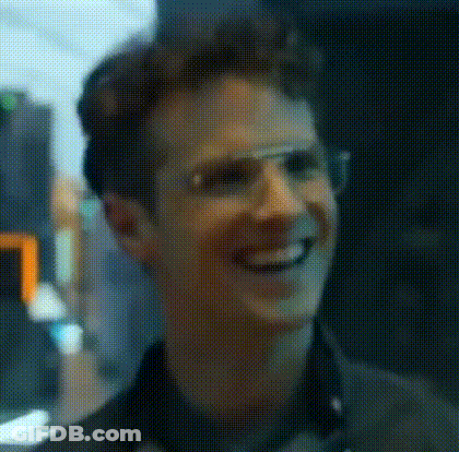 Man In Glasses Smiling Blurry Photo GIF