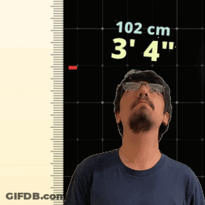 Man In Glasses Standing In Front Of Ruler Saying 102 Cm 3' 4 GIF