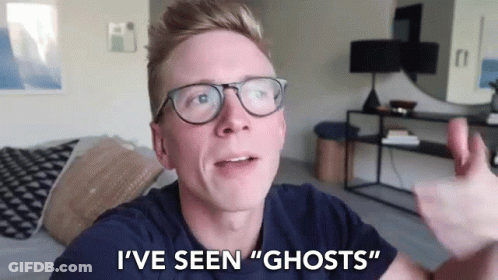 Man In Glasses Talking About Ghosts GIF